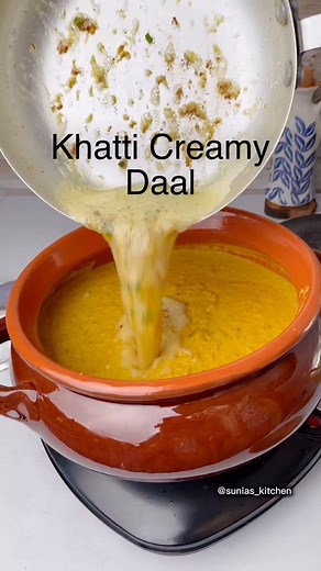 Khatti Creamy Daal – Tangy, rich, red lentil This recipe is simple, comforting and so delicious specially in winter when it is served with fresh. It is sure to become a family favorite. My family loves it paired with crispy parathas, naans, or roti! Ingredients: • Red lentils: 1 1/2 cups • Yogurt: 500g • Salt: 1 tbsp • Red chili powder: 1 tbsp • Turmeric: 1 tsp • Coriander powder: 1 tsp • Cumin (zeera): 1 tsp • Ginger: 1 tbsp, grated • Garlic: 1 tbsp, minced • Green chilies: 2, slit • Fresh cori