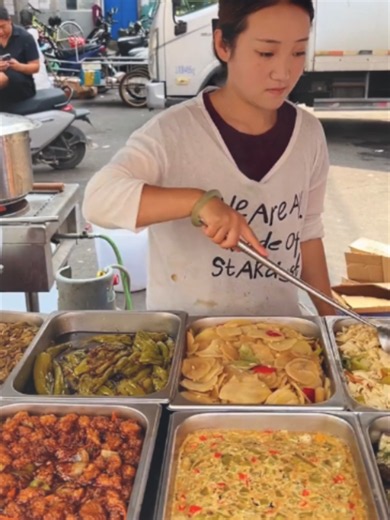 Pork, veggies, egg custard, and rice—three packed boxes for 10 yuan (about $1.50), and she can barely close the lids! #foodtok #foodies #streetfood #lunchbox