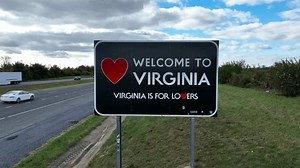 Virginia , United States - 10 31 2023: Welcome to Virginia sign. Aerial orbit of state border sign. Virginia is for Lovers.