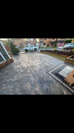As you can see from the before and after there was a huge transformation on this project. Using a combination of different colours really set off the borders quite well paving used was a granite colour 45° herringbone paving for centre drive borders was a combination of charcoal and a natural grey also installed a circle on the driveway for character. Driveway completed by lake stone paving | Lake Stone Paving