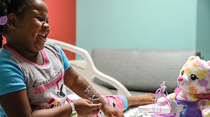 Story from Our Lady of Lourdes: Child life specialist comforts sick children through education and play