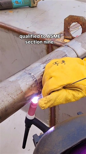 Open-field GTAW pass on stainless steel pipe spool meeting ASME Section IX standards.