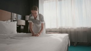 Female Housekeeper Uniform Smoothing Bed Linens Stock Footage Video (100% Royalty-free) 3767497207 | Shutterstock