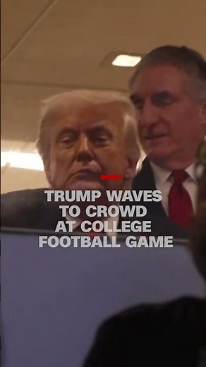 Trump waves to crowd at the College Football National Championship