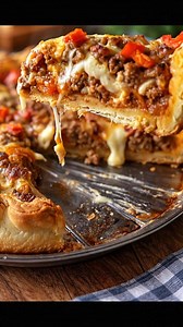 There's nothing quite like slicing into a hearty deep-dish pizza that’s bursting with gooey cheese and savory goodness, just like the one my family used to share on game nights. You'll want to grab a slice before everyone else does! Full recipe's in the comment 👇 | Recipes & Cooking Guide