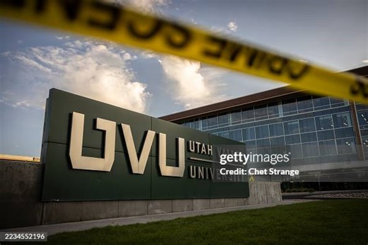 Crime scene tape stands in front of Utah Valley University following...