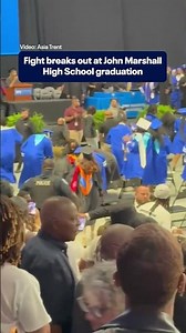 Fight breaks out at high school graduation