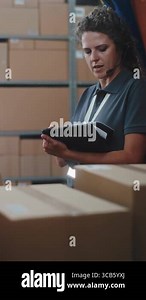 Multiethnic Workers Unloading Cardboard Boxes with Online Orders, Goods from Delivery Truck. Female Manager Using Tablet Computer and Barcode Scanner. Logistics Retail Warehouse. Vertical Shot Stock Video Footage - Alamy