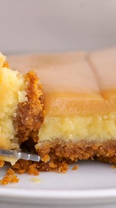 6.2K views · 59 reactions | These Caramel Cheesecake Bars are easy to make with a buttery graham cracker crust, tasty cheesecake layer and topped with soft, homemade caramel. These are the best cheesecake bars we have ever tasted and everyone always asks for the recipe! Check it out here: https://www.sixsistersstuff.com/recipe/caramel-cheesecake-bars/ | Six Sisters' Stuff | Facebook
