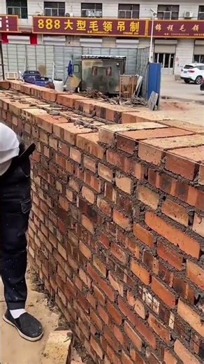 Apply the mixture to the wall surface and quickly attach the stone #bricklaying #construction