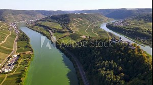 Rising aerial drone shot of the Moselle River bend in Bremm, Germany.