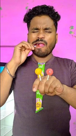 Colorful Lollipops Taste Test - Pink, Yellow, Red!"by technical fuchkul