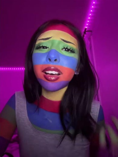 Makeup transformation with rainbow face art#rainbowmakeup #faceart #makeupartist