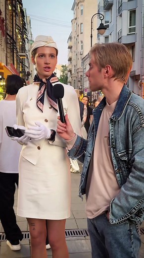 707K views · 14K reactions | I don’t hide my tattoos before filming videos, but at work I always cover them with a band-aid, and I wear a skirt below the knees at work. This is the first time I’ve given an interview on such a scale, and I’m very confused reaction #crew07 #fashionweek #stewardess #Shorts | Air Lady Jet | Facebook