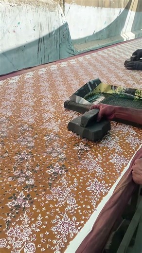 Artist creating unique block print designs using wooden blocks #Handmade #ArtWork