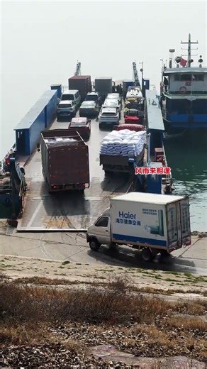 Truck drivers queue up to board boats and ferries to cross the river. Safety is the first of tho