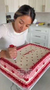Cake decorating a half a sheet cake with buttercream for a baby shower. The idea was a vintag.