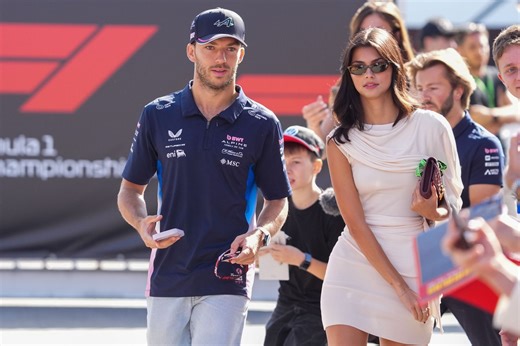 Pierre Gasly and girlfriend Kika Gomes zip through the streets of Milan, Italy on their e-scooter