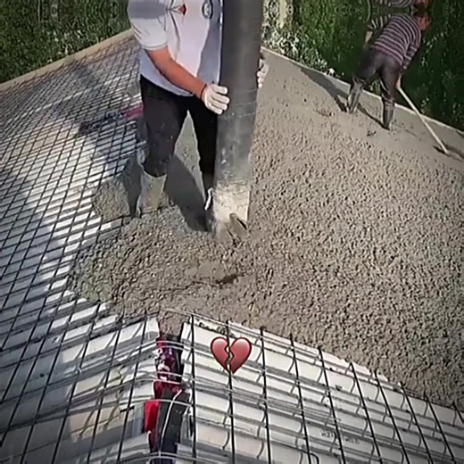 Construction Workers in Action on Site