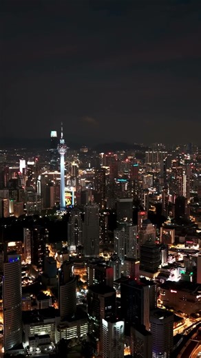 Kuala Lumpur, Malaysia | Urban Layers Framed by Green Hills