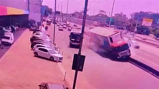Out-of-control truck flips and nearly hits bus in Brazil