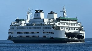 Ferry rocks significantly back and forth after Navy ship creates large swell