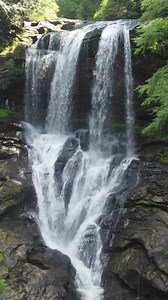 Did you know you could walk behind this waterfall in North Carolina?! #nc #NorthCarolina #waterfalls #waterfallphotography #wnc #wncmountains #nctripping #travel #dronephotography | NC Tripping