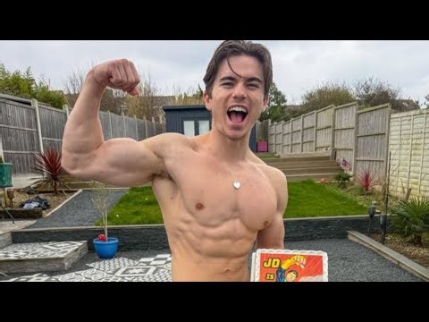 Young man flexing muscles