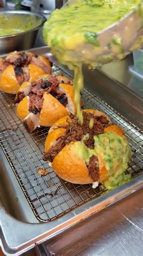 Third Wave - Burgers, BBQ on Instagram: "Three loaded brioche bombs sliced and stuffed with cheese, multiple kinds of beef then baked covered in garlic butter. One packed with shredded bone-in beef rib, one loaded with slow-smoked brisket, and one filled with our rich pulled brisket birria. Baked until molten, messy, and completely out of control. Experience 3 different beefy flavours. Serves 2–3 people… or 1 beef lover."