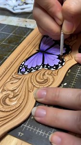 The possibilities are endless with Angelus Leather Paints. Watch as Lindsay Ferguson (IG: @braidedrootscraftco) paints a piece of tooled leather and then sews it onto their custom bottle holder Would you try this DIY project out? #angelusdirect #angeluspaint #leatherwork #artsandcrafts #tooledleather | Angelusdirect.com