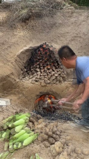 Rustic fire cooking deep in the ground. #rusticcooking #ruralcooking #shorts