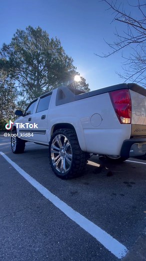 Custom Dual Exhaust System for Chevy Avalanche with 4 Inch Rolled Tips