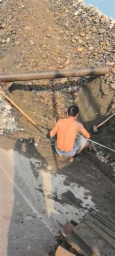 The process of workers unloading sand and gravel at the dock of a ship #cargoship #sandandgravelship #sand #unloading #shiploading #crew #phosphatemine #ore #sandandgravel | Unloading Sailors