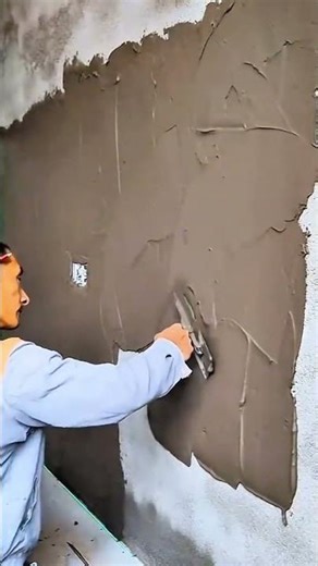 Aligning Large Wall Tiles Using a Laser Level for Perfect Vertical Installation