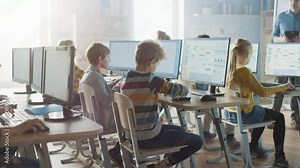 Elementary School Computer Science Classroom: Smart Little Schoolchildren Work on Personal Computers, Learn Programming Language for Software Coding. Schoolchildren Getting Modern Education