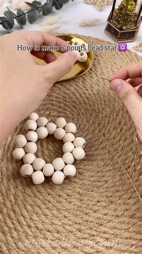 🌿Nghi Ho | Macrame Artist, Author & Teacher🌿 on Instagram: "✡️6 points wooden bead star for this Christmas, anyone are interested to make?🤩 For this tutorial I am using 30 wooden beads size 20mm, one rope (you can use yarn or transparent thread ) with a length of 1m (1.1yd) and a yarn needle. If you use bigger beads, you will need longer rope, that's it! Super simple but lovely decoration. Hope you enjoy the tutorial!🤍 #macramechristmas #macramechristmastree #macramechristmasdecor #christmas