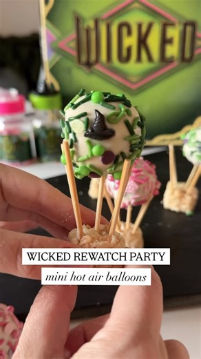 Lauren Reed on Instagram: "Fully obsessulated with these Wicked sprinkles right now. 💚🩷🫧 Thank you @candi.fetti for the cutest PR. If you want any of these goodies, you can find them at @walgreens ! I wanted something quick and themed for our Wicked rewatch party and these mini hot air balloons were perfect! I used donut holes because cake pops are a little too time consuming and just melted some candy melts for the icing on the outside. My girls devoured them and honestly the sprinkles were 