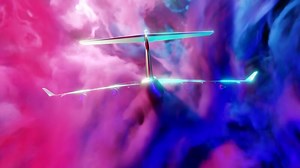 Flight. Design. Clouds of bright light smoke in which a small plane flies gently swaying in different directions in a cartoon animation.