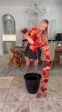 DIY Fall Tree!🍁 All you need is a tomato cage, planter, fall garland, string of lights, and a