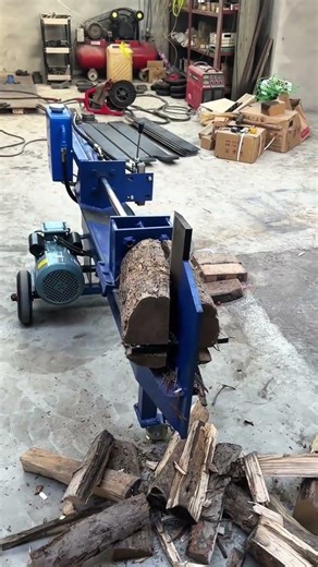 Splitting a Large Wooden Log into Firewood Using an Electric Hydraulic Log Splitter Machine