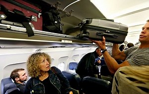 200K views · 710 shares | United Airlines is THE WORST. Now they've decided to CHARGE for overhead space?! Are you kidding me?! This is what you should know if you're traveling... | Philip DeFranco | Facebook