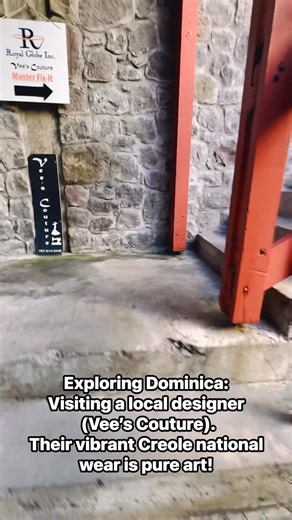 Dropped into local #designer Vee's Couture studio while shopping for my #Creole wear in #Dominica🇩🇲 and whew… although I eventually went with a stunning #yellow Wob Dwiyet from Dons & Divas Boutique the #pink Wob (dress) in this video is Dominica’s national wear expressed as pure #art in motion. I want to @highlight the work because it is #Spectacular to me! 💚💛❤️ The colors? #Vibrant. The craft? Impeccable. And the #shop itself is tucked inside an older building wrapped in our signature #sto