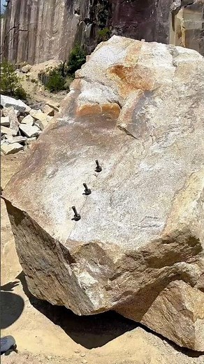 Splitting Massive Granite: Using Plug and Feather Technique on Quarry Stone