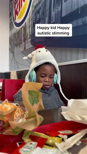 Happy Autistic Kid Stimming Happily