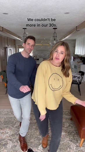 Playful Dance Routine in Modern Kitchen