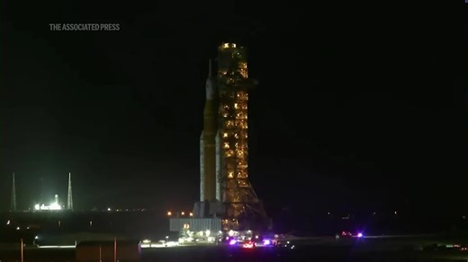 NASA hauls its repaired moon rocket from the hangar back to the pad for an early April launch