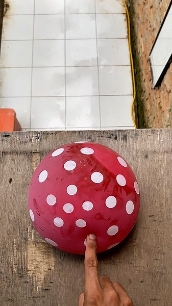 Experiment: Dropping a water balloon from a height, does the balloon explode?