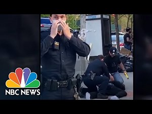 Video Captures New York City Police Officer Brandishing Stun Gun, Slapping Man | NBC News