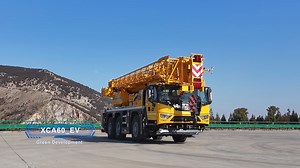 Leading the green revolution in the industry, the XCA60_EV is the world's first hybrid all-terrain crane with zero emissions. 🔹 Combined with the G-ICON series full-scenario intelligent control technology, these innovative machines take heavy-duty operations to new heights. 🔹 The G-ICON 360°panoramic images, wireless remote control, heavy-duty single-transverse arm independent suspension system, and single control for counterweight erection provide operators with unprecedented intelligence and