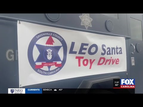 Emergency workers gather at Target store in response to LEO Santa's call for help